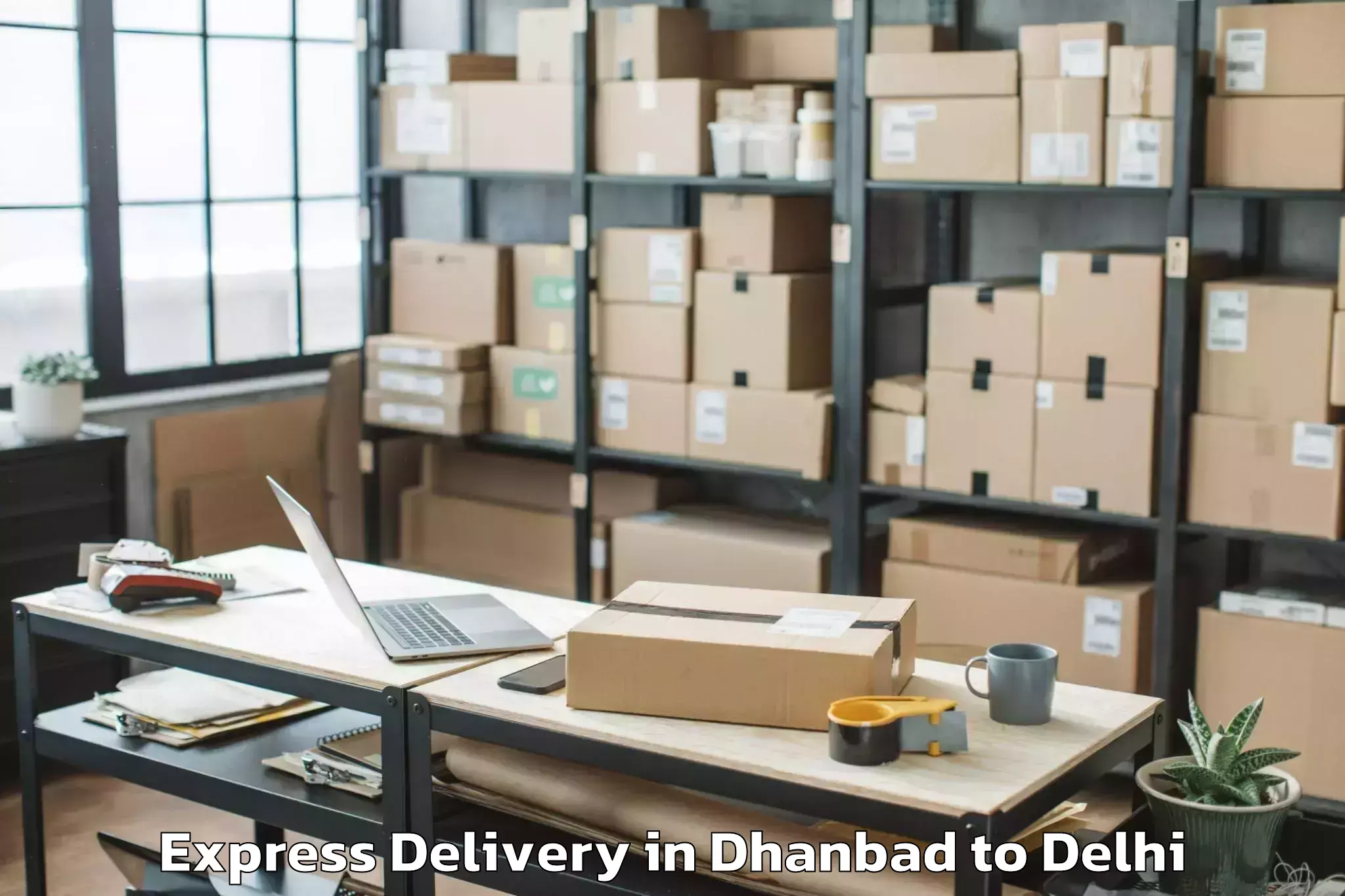 Book Dhanbad to C R R I Express Delivery